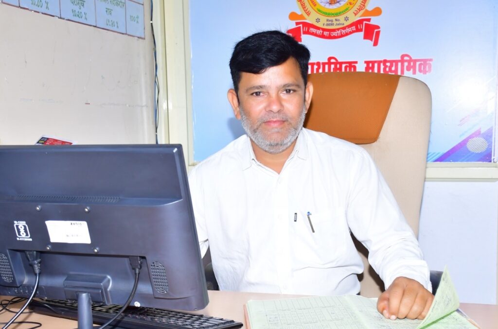 Principal Dipak.T.Khandalkar.